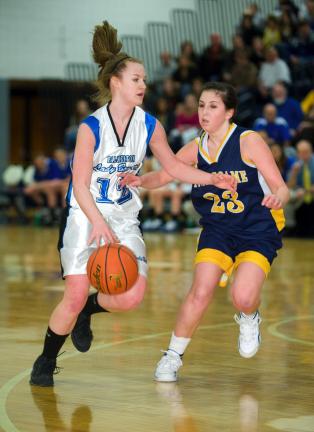 BOB FORD/TIMES NEWS Palmerton's Kristen Romano dribbles around Notre Dame's Allison Spirk as she makes a move to the basket.