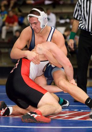 Bob Ford/TIMES NEWS Tamaqua's Garth Lakitsky, top, tries to turn Ian Gimbar of Saucon Valley to his back during their 189-pound Class AA title match.