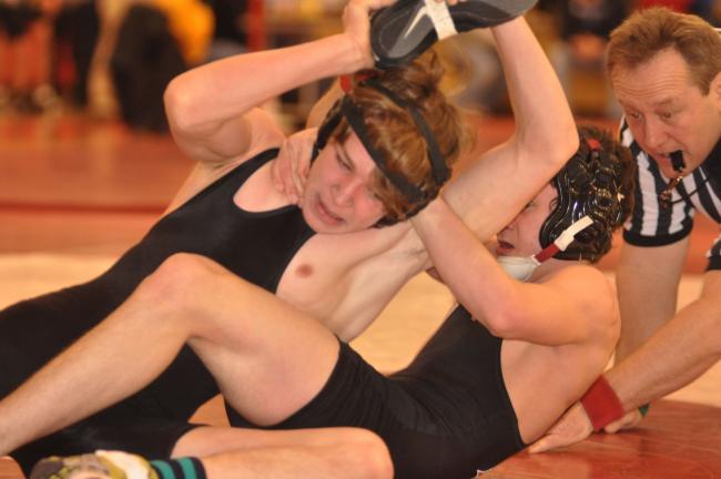 Four wrestlers in semifinals