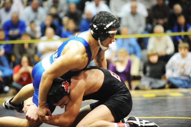 DON HERB/Special to THE TIMES NEWS Jordan Toledo (top) of Pleasant Valley tries to get away from Easton's Mitchell Minotti in their 3A district final.