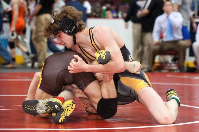 Northwestern Lehigh's Dylan Long reverses Milton Hershey's Nick Lamoreaux in the first round of consolations. Long won the bout 6-4 in overtime.