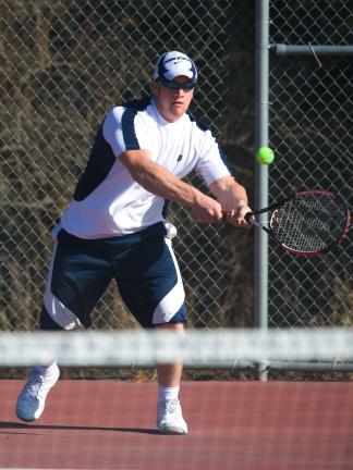 bob ford/times news Tamaqua's Shane Oliver returns a shot during Wedenesday's match against Jim Thorpe.
