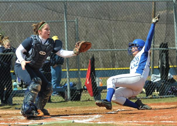 STEVE SHINKO/SPECIAL TO THE TIMES NEWS Tamaqua catcher Emily Zancofsky waits for the ball as Southern Lehigh's Cory Ozanne slides home safely during Saturday's softball game at Tamaqua.