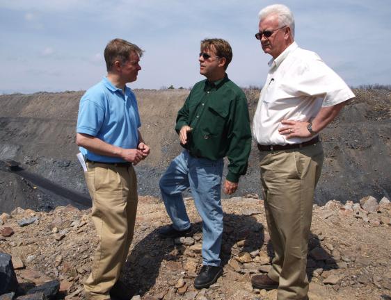 ANDREW LEIBENGUTH/SPECIAL TO THE TIMES NEWS Sen. Dave Argall, left, and Rep. Jerry Knowles, right, listen to Dan Blaschak, vice president of Blaschak Coal Corp., as he discusses future anthracite mining topics, during the anthracite tour at the…