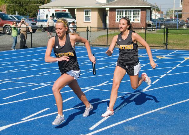 steve shinko/special to the times news Panther Valley's Krista Mantz (right) hands the baton off to Olivia Markovich during the girls' 400 relay Thursday against Tamaqua.