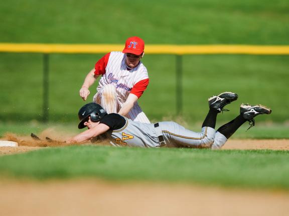 BOB FORD/TIMES NEWS Jim Thorpe's Pat Janecki puts the tag on Ryan Porambo of Panther Valley just before he gets to second base. Porambo was out on the play.