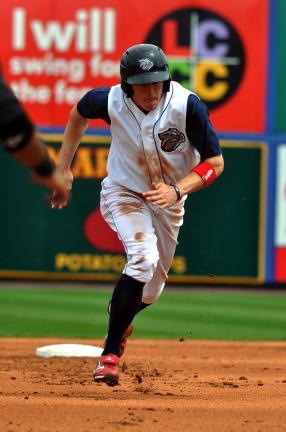mike feifel/times news The Iron Pigs' Rich Thompson runs the bases during Sunday's game. Thompson had three hits and two stolen bases in a loss to the Indians.