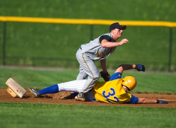 BOB FORD/TIMES NEWS Marian's Scott Nietz slides into second base as Panther Valley's Kyle McAvoy covers. Neitz kicked the base and was out on the play.