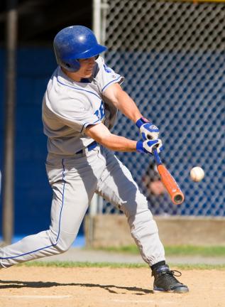 bob ford/times news Pleasant Valley's Jake Chamberlain connects for a single against Pocono Mountain West.