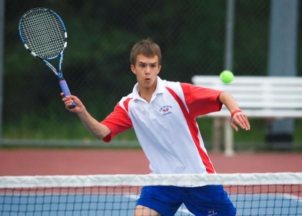 Bob Ford/times news Jim Thorpe's Oliver Schulz prepares to return the ball at the net during Tuesday's match with Saucon Valley. Schulz teamed with Josh Mohn at the No. 1 doubles position.