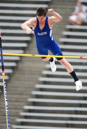 Bob Ford/TIMES NEWS Palmerton's Lanny Buck clears the bar in the pole vault during Wednesday's District 11 meet. Buck captured first in the event.