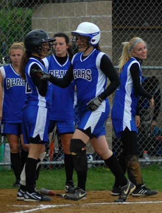 Ron Gower/TIMES NEWS Megan Hardy of Pleasant Valley is all smiles as she heads home following a three-run homer in the third inning against East Stroudsburg South on Wednesday.