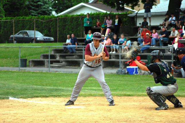Ron Gower/TIMES NEWS Lehighton senior Dave Behler watches as the fourth ball is given up to him in the bottom of the eighth inning. Dust is emitted from the mitt of Allentown Central catcher Ryan Smale. The fourth ball came with the bases loaded and…