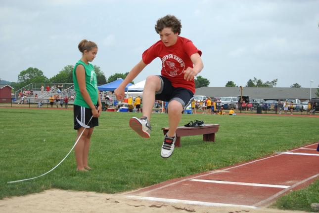Brad Begel of Oklahoma shows a determined effort in long jump.