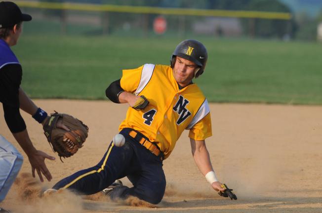 NANCY SCHOLZ/Special to THE TIMES NEWS Northern Valley's Colton Breininger slides in to third base ahead of the throw in Tuesday's 16-6 win over Southern Lehigh.