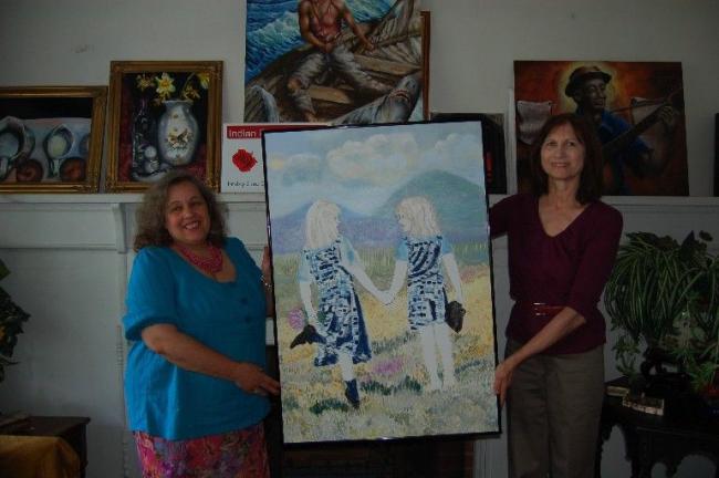 KAREN CIMMS/TIMES NEWS Alessandra Crum, left, and Elda Walsh, with one of Walsh's acrylics. This and some of the other work pictured will be featured in The Rose Room Art Exhibit at the Albright Mansion Restaurant in Jim Thorpe this weekend.