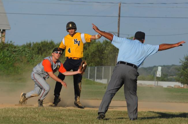 NANCY SCHOLZ/Special to THE TIMES NEWS Lehighton's Kyle McAvoy shows the ball to the umpire as Northern Valley's Colton Breininger is called safe.
