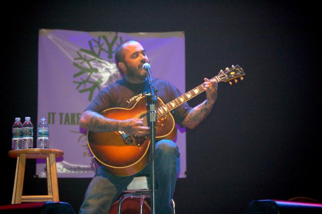 Aaron Lewis performs Staind hits on acoustic guitar at Penn's Peak Thursday night. JOE PLASKO TIMES NEWS