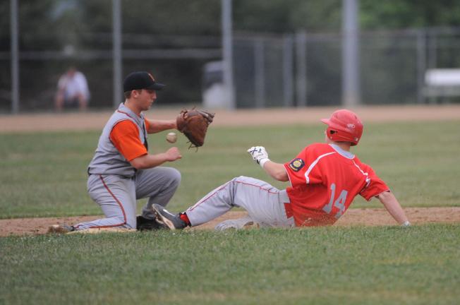 South Parkland's Craig Miller slides into second base as Lehighton's Kyle McAvoy tries to take hold of the ball and get the out. Miller was safe on the play. NANCY SCHOLZ /Special to THE TIMES NEWS