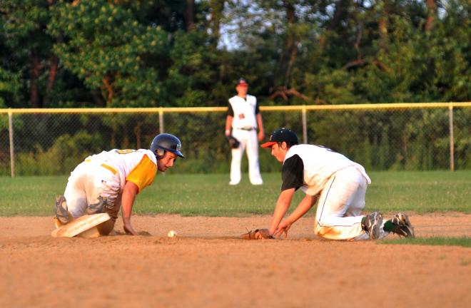 MIKE FEIFEL/TIMES NEWS Shawn Tripp (left) of Bushkill Township slides into second base safely as Franklin Township's Cole Rex can't hold onto the throw.