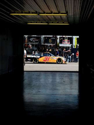 BOB FORD/TIMES NEWS Jeff Burton's No. 31 Caterpillar Chevrolet sits outside of the garages at Pocono Raceway prior to qualifying on Friday. Burton will start 8th on Sunday in the Sunoco Red Cross Pennsylvania 500.