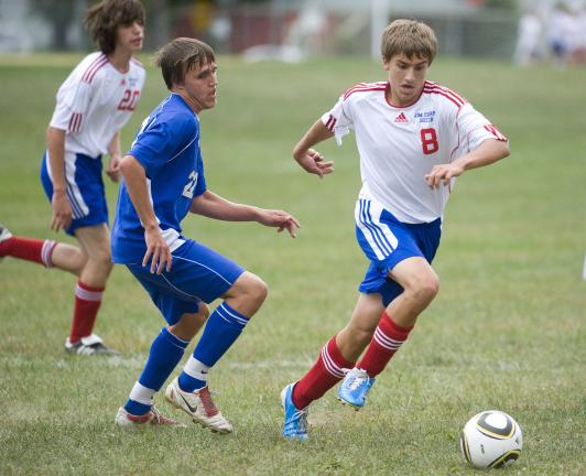 bob ford/times news Jim Thorpe's Mitch Franko (8) dribbles past Blue Mountain's Caleb Berg during Thursday's Schuylkill League contest.