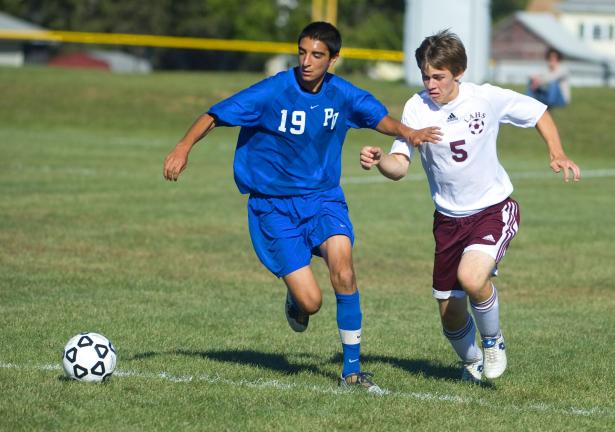 Alex Mansour of Pleasant Valley moves in front of Lehighton's Nick Kern as the two try to take possession of the ball during Monday's Mountain Valley Conference soccer match. The Bears won, 8-1. BOB FORD/TIMES NEWS