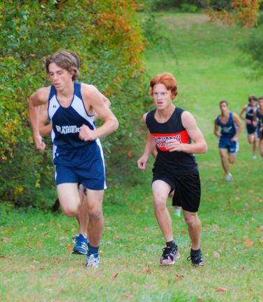 Weatherly's Andrew Vack (right) works his way uphill on Tamaqua's cross country course. PATRICK DEUTSCH/SPECIAL TO THE TIMES NEWS