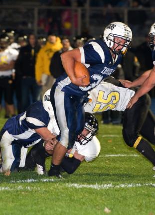 bob ford/times news Tamaqua's Garth Lakitsky breaks away from a Panther Valley tackler on his way to a touchdown.