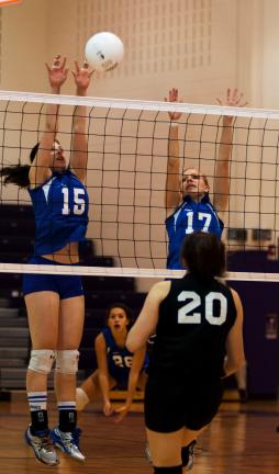 PATRICK DEUTSCH/TIMES NEWS Pleasant Valley's Paige Band (15) and Crystal Cambria goes up for the block against East Stroudsburg North.