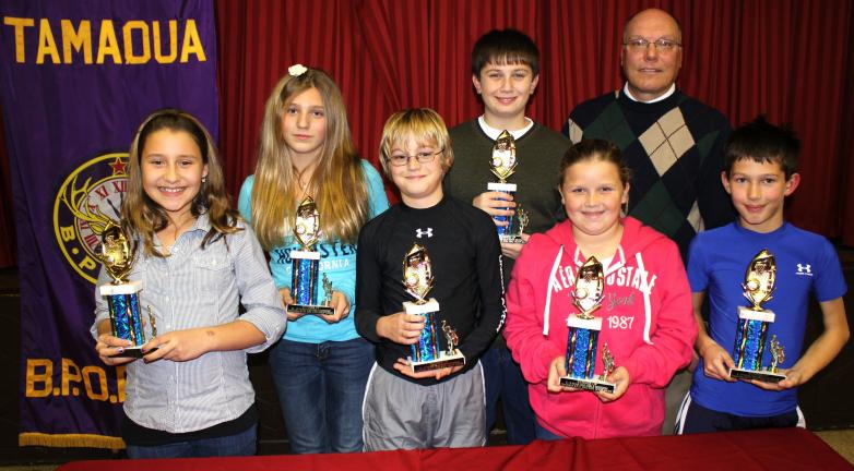 Andy Leibenguth/times news @Caption Stand Alone:Tamaqua Elks Hoop Shoot runner-ups Second place winners during the Tamaqua Elks 2010 Hoop Shoot were, front row, from, left are Mady Coccio, Riley McHugh, Emily Titus, and Derian Stianche. Back row,…