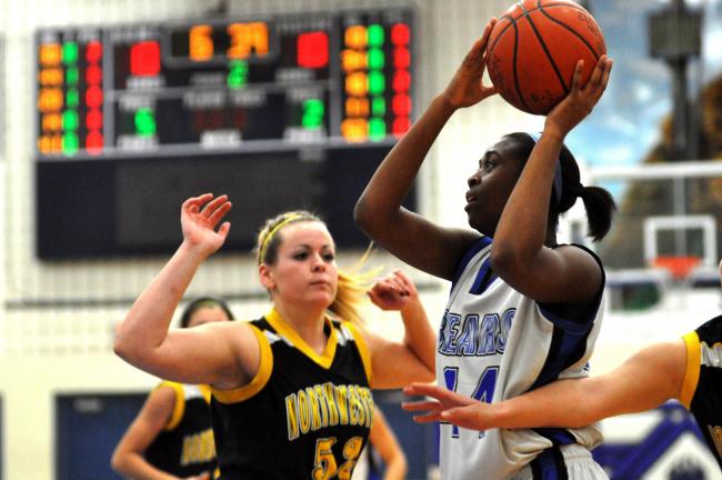 mike feifel/times news Pleasant Valley's Dalian Salmon (left) looks for a teammate as Jessica Albright of Northwestern defends.