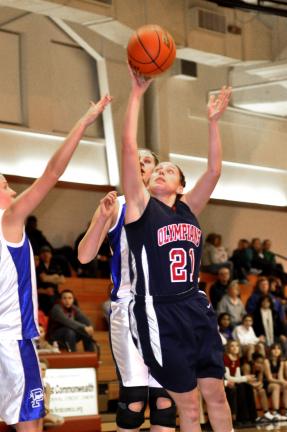 mike feifel/times news Jim Thorpe's Brittany Holland goes between Palmerton defenders Jen Snyder (left) and Kelsey Hay to get off a shot.