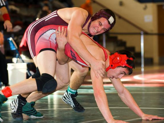 Lehighton's Anthony Farole (top) tries to take down Bound Brook's Merrick Ash in their 145-pound semifinal bout. Farole won 5-3 in overtime to reach the championship bout.