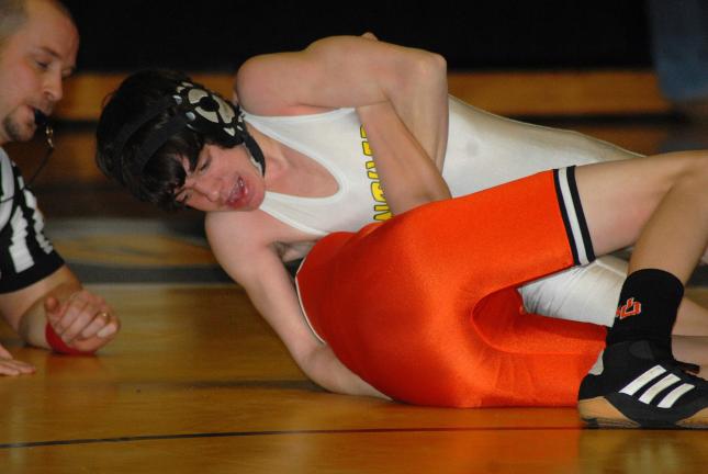 ron gower/times news Len Ogozalek (top) of Panther Valley closes in on a pin of Upper Dauphin's James Lesh.