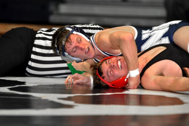 mike feifel/times news Northern Lehigh's Zane Heller (top) racks up back points on Spencer Beaver of Saucon Valley on his way to a technical fall at 125 pounds.