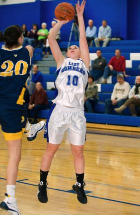 BOB FORD/TIMES NEWS Palmerton's Katie Reimer (10) goes up for a shot as Notre Dame's Brittany Pierzga moves in at left.