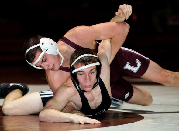 bob ford/times news Jeremy Gornick (top) of Lehighton tries to turn Anthony Ayr of East Stroudsburg North. Gornick eventually picked up a pin.