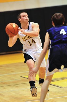 NANCY SCHOLZ/TIMES NEWS Northwestern's Payton Bachman looks to pass the ball around Salisbury defender Brent Maron.