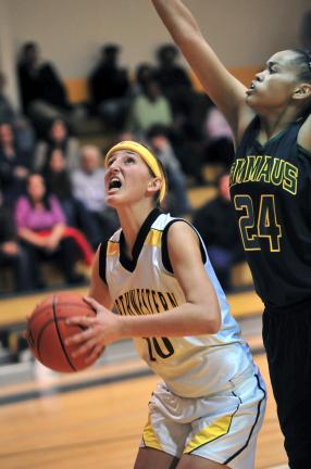 NANCY SCHOLZ/Special to the TIMES NEWS Northwestern's Sara Jones (10) uses a head fake before taking a shot as Emmaus' Leah Horton defends from behind.