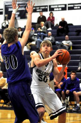 mike feifel/times news Lucas Pierce of Northern Lehigh (50) gets ready to go up with a shot as Aaron Rockel defends.
