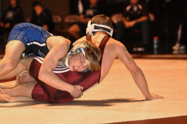 MIKE FEIFEL//TIMES NEWS Kenny Yanovich (left) of Pleasant Valley keeps control of Lehighton's Jacob Hoats at 103 pounds for a 11-3 major decision.