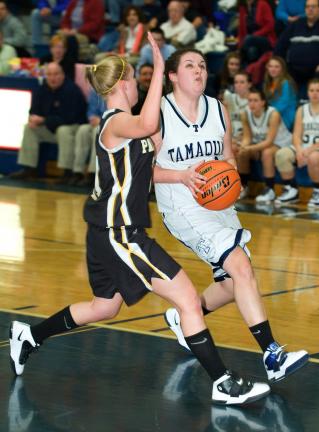 BOB FORD/TIMES NEWS Tamaqua's Cassie Eroh drives to the hoop as Panther Valley's Mary Jane Thomas moves in to defend.
