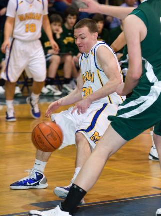 Bob Ford/TIMES NEWS Marian's Mike Nesgoda drives toward the basket during Thursday's game against Nativity.