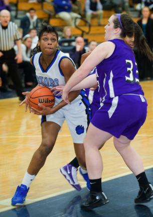 BOB FORD/TIMES NEWS Pleasant Valley's Kalecia Harris (left) pulls the ball away from East Stroudsburg South's Tara Steakin.