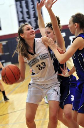 Nancy Scholz/times news Aimee Oertner (33) of Northern Lehigh is defended tightly by a pair of Southern Lehigh players.