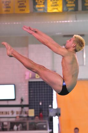 Nancy Scholz/Special to THE TIMES NEWS Dane DeWire of Tamaqua does a back dive earning 29.60 points for his first attempt at the District 11 Class aA Championships. DeWire went on to win the gold medal.