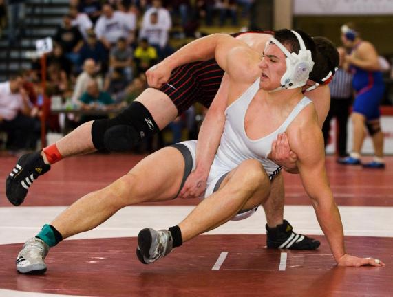 BOB FORD/TIMES NEWS Tamaqua's Garth Lakitsky goes for the escape from Bermudian Springs' Matthew Wolf in the semis. Lakitsky won the bout 8-5.