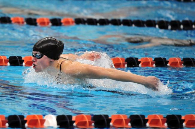 Madison Burns of Northwestern swims the butterfly leg of the 200 IM on Wednesday at the PIAA Class AA Swim Championships. Burns won a gold medal in the event.