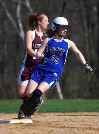 Pleasant Valley's Melissa Ejk (00) rounds second base as Lehighton's Krista Rehrig moves in from behind. The Bears posted an 11-1 Mountain Valley Conference victory.